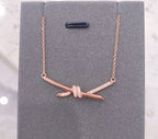 KNOT NECKLACE DIAMONDS