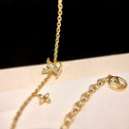 LV LOGO STAR MOTIF GOLD BRACELET