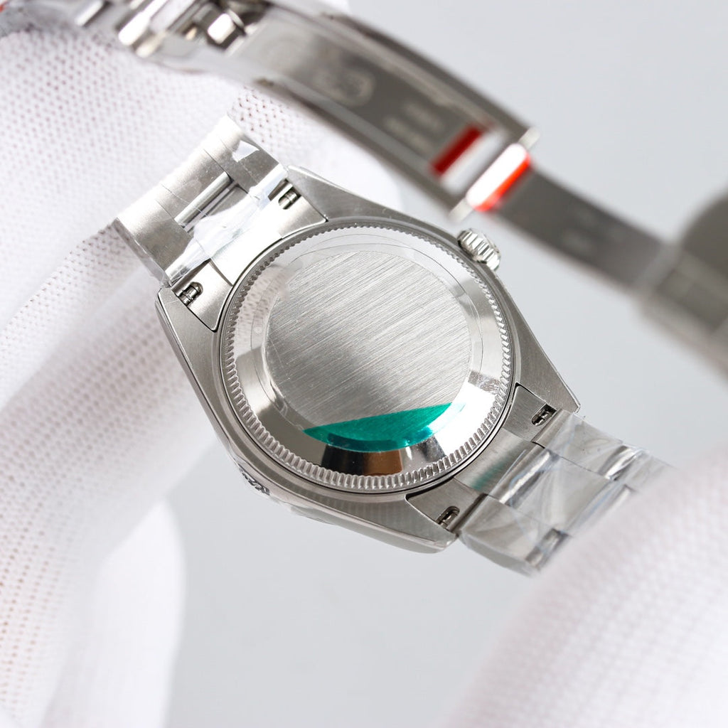 OYSTER PERPETUAL 31MM GREEN DIAL