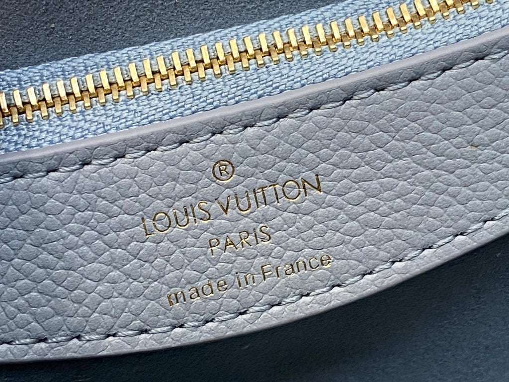 diane 24 light blue monogram empreinte leather