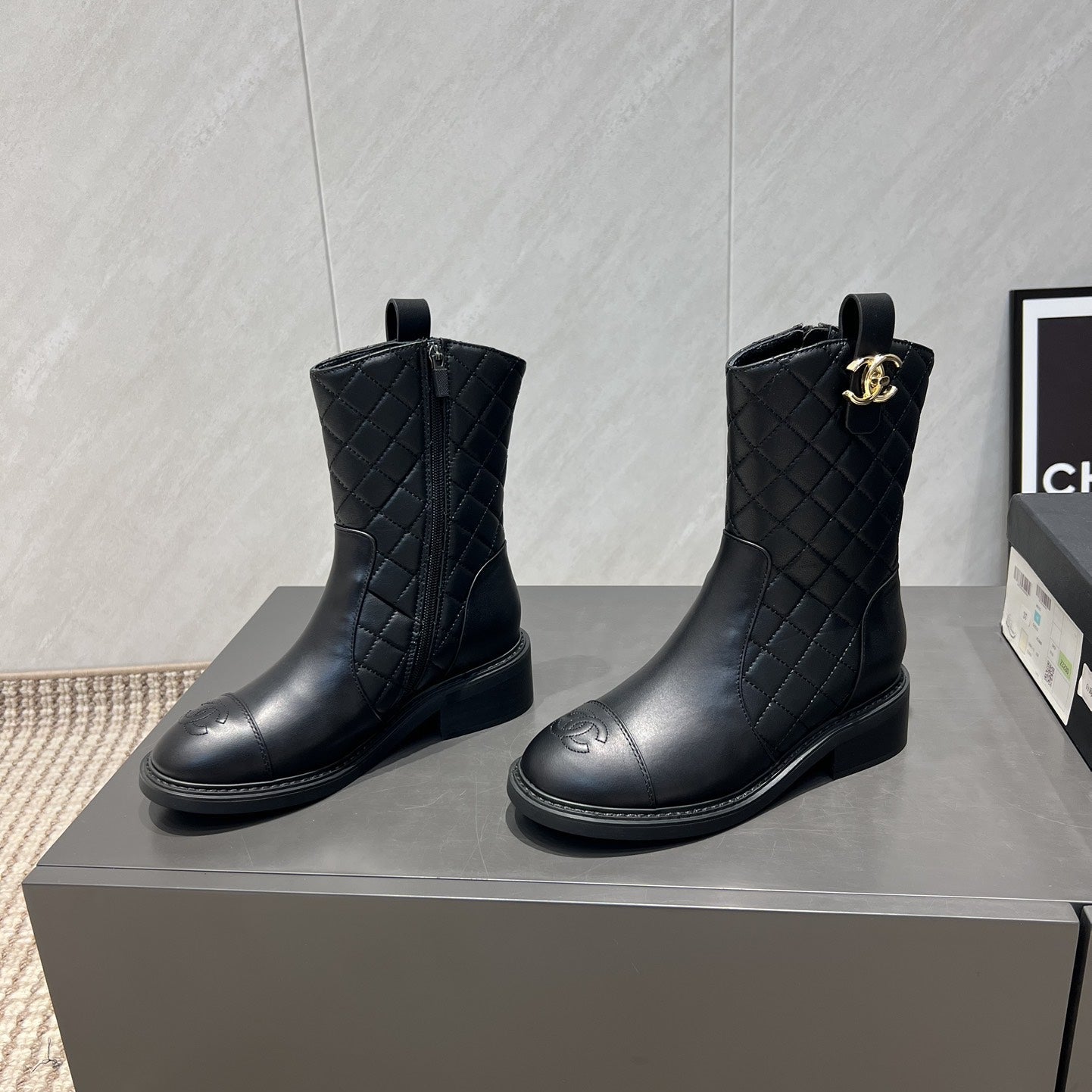 CC 25S Round-Toe Zippered Ankle Boots in Black Cowhide and Embroidered Latticework 442503