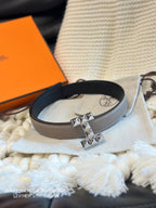 H QUIZZ PARTY BELT 24MM SILVER BUCKLE & REVERSIBLE GRAY AND BLACK LEATHER