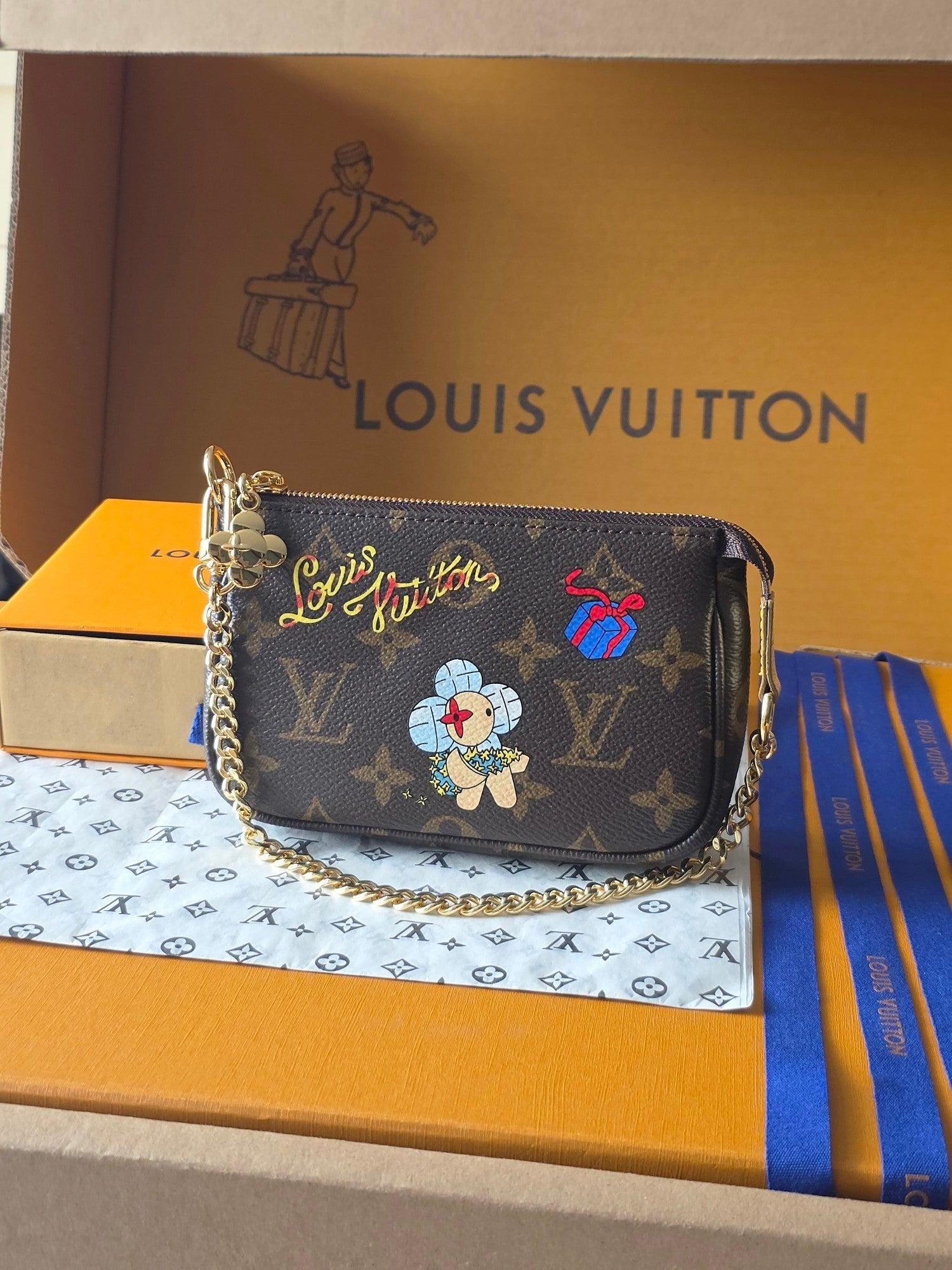 LV Chrismas Collection Mini Pochette Accessoires clutch bag Brown Monogram Canvas 274915
