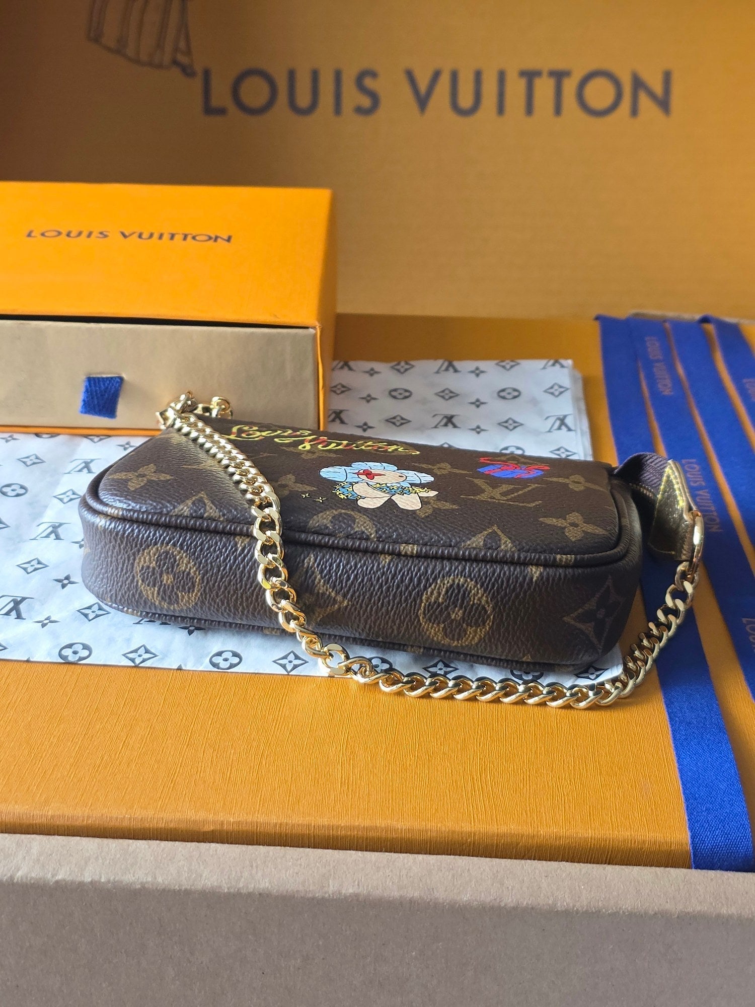 LV Chrismas Collection Mini Pochette Accessoires clutch bag Brown Monogram Canvas 274915