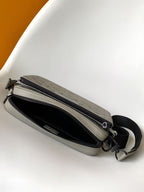 TRIO MESSENGER 25 IN GRAY MONOGRAM SHADOW CALFSKIN