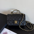 Chanel Mini Flap Handle 19.5cm Black in Caviar leather 284669
