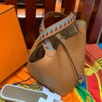 HM PICOTIN LOCK 18 COPPER EPSOM LEATHER WITH BRAID STRAP