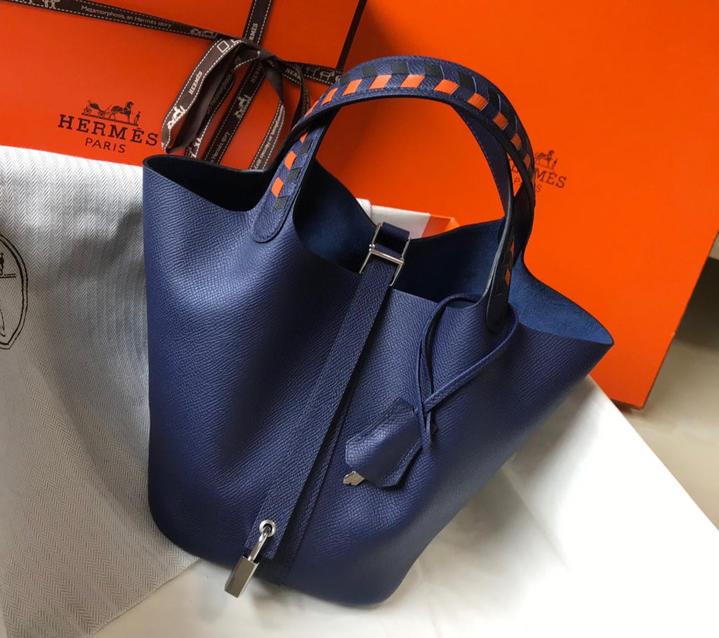 HM PICOTIN LOCK 18 NAVY EPSOM WITH BRAID STRAP