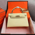 HM KELLY MINI 22 PASTEL YELLOW CROCODILE EMBOSSED CALFSKIN GOLD HARDWARE