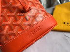 PETIT FLOT BUCKET BAG 22 IN ORANGE GOYARDINE CANVAS AND LAMBSKIN TRIM
