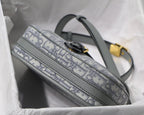 MEDIUM CD BOBBY 22CM GREY OBLIQUE CANVAS GOLD HARDWARE