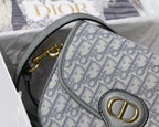 MEDIUM CD BOBBY 22CM GREY OBLIQUE CANVAS GOLD HARDWARE