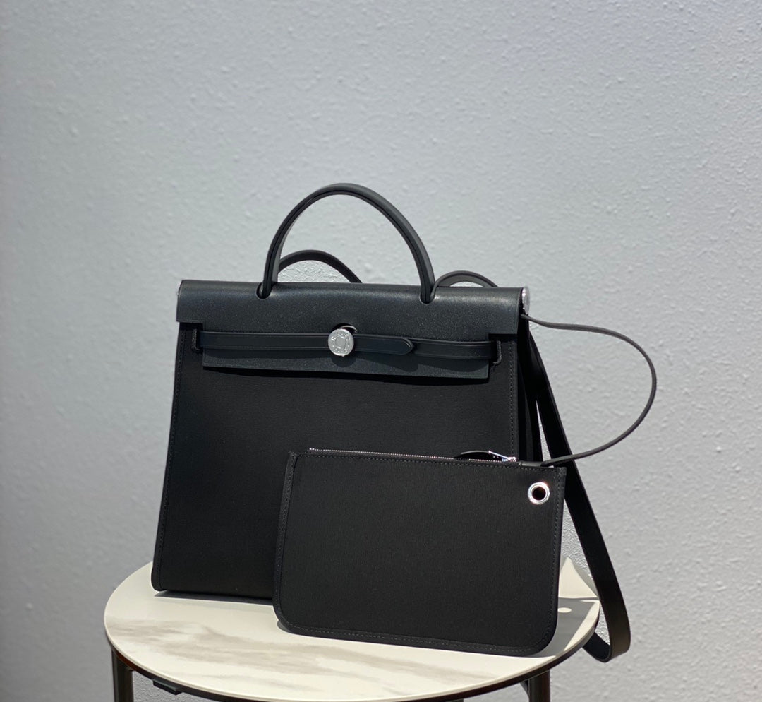Herbag 31 Toile Black Canvas Black Cowhide Leather