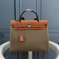 HM HERBAG ZIP 31 OLIVE AND BRONZE CANVAS