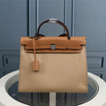 HM HERBAG ZIP 31 KHAKI AND BRONZE CANVAS