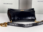 DOWNTOWN SHOULDER BAG 29 IN BLACK WAXED SHEEPSKIN GOLD HARDWARE