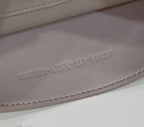 PEEKABOO ISEEU 34 IN WHITE PERFORATED CALFSKIN GOLD HARDWARE