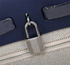 HM HERBAG ZIP 31 NAVY AND CREAM MONOGRAM CANVAS