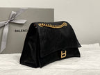 CRUSH MEDIUM CHAIN BAG 31 IN BLACK CRUSHED CALFSKIN GOLD HARDWARE