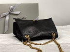 CRUSH MEDIUM CHAIN BAG 31 IN BLACK CRUSHED CALFSKIN GOLD HARDWARE