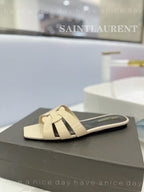 SL TRIBUTE SLIPPERS GLOSSY PASTEL YELLOW CALFSKIN