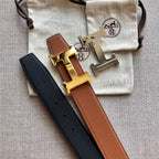 HM BELT BUCKLE & REVERSIBLE BLACK AND BRONZE BROWN LEATHER STRAP 38MM GOLD HARDWARE