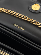 CRUSH CHAINED BAG 22 IN BLACK QUILTED CRUSHED CALFSKIN GOLD HARDWARE