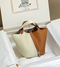 picotin lock 18 gold white togo shw