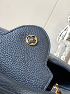 capucines bb 27 midnight blue taurillon leather gold hardware