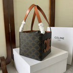 CUBE BAG 15 IN BLACK TRIOMPHE CANVAS AND BROWN CALFSKIN