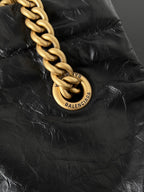 CRUSH SMALL TOTE BAG 26 IN BLACK CRUSHED CALFSKIN GOLD HARDWARE