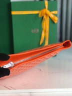 CONTI POUCH 24 IN ORANGE LAMBSKIN AND GOYARDINE CANVAS