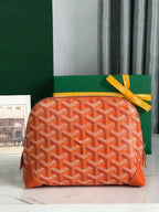 VENDÔME COSMETIC POUCH 17 IN ORANGE GOYARDINE CANVAS AND CALFSKIN TRIM