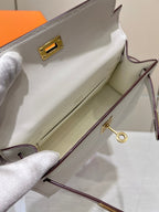 HM KELLY POCHETTE 22CM WHITE SWIFT GOLD HARDWARE