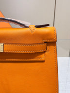 HM KELLY POCHETTE 22CM ORANGE SWIFT GOLD HARDWARE