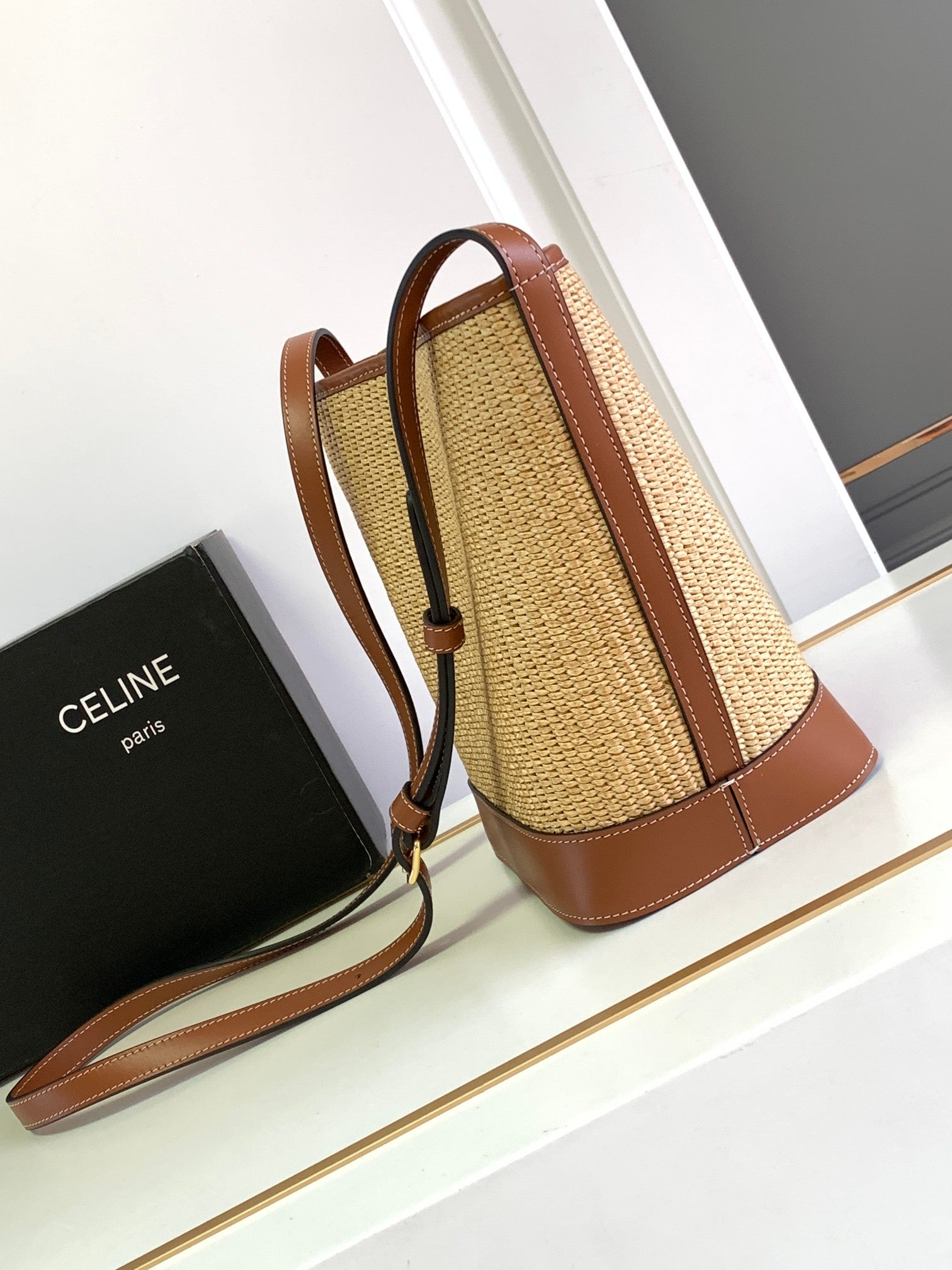 SMALL BUCKET CUIR TRIOMPHE 22CM IN STRIPED TEXTILE AND TAN CALFSKIN