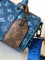 LV 21s Keepall Bandoulière 25 Blue Monogram Canvas & Cowhide