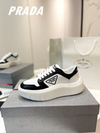 PRA DOWNTOWN THICK-SOLE SNEAKERS BLACK AND WHITE CALFSKIN