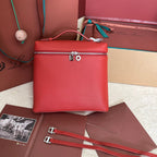 EXTRA POCKET BACKPACK L23.5 IN CINOBER RED CALFSKIN WITH SILVER HARDWARE