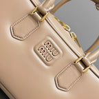 RESTRO SMALL 27 IN TAUPE PINK IN CALFSKIN