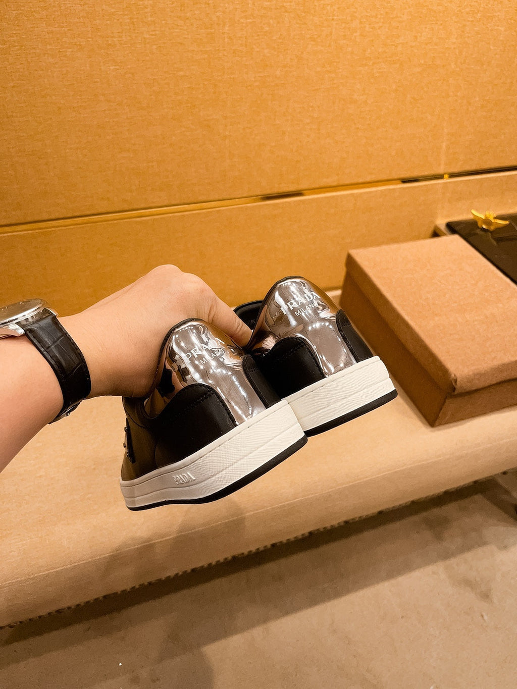 PRA SNEAKER IN BLACK CALFSKIN WITH GLOSSY GOLDEN
