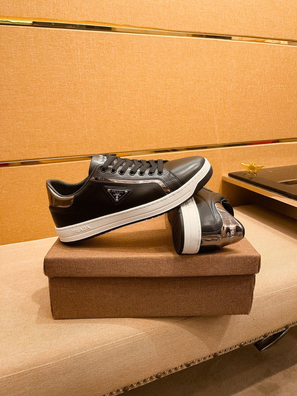 PRA SNEAKER IN BLACK CALFSKIN WITH GLOSSY GOLDEN