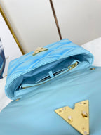 GO-14 MM 23 IN SKY BLUE QUILTED LAMBSKIN GOLD HARDWARE
