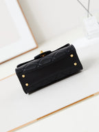 24a flap bag with top handle 18cm black lambskin gold hardware