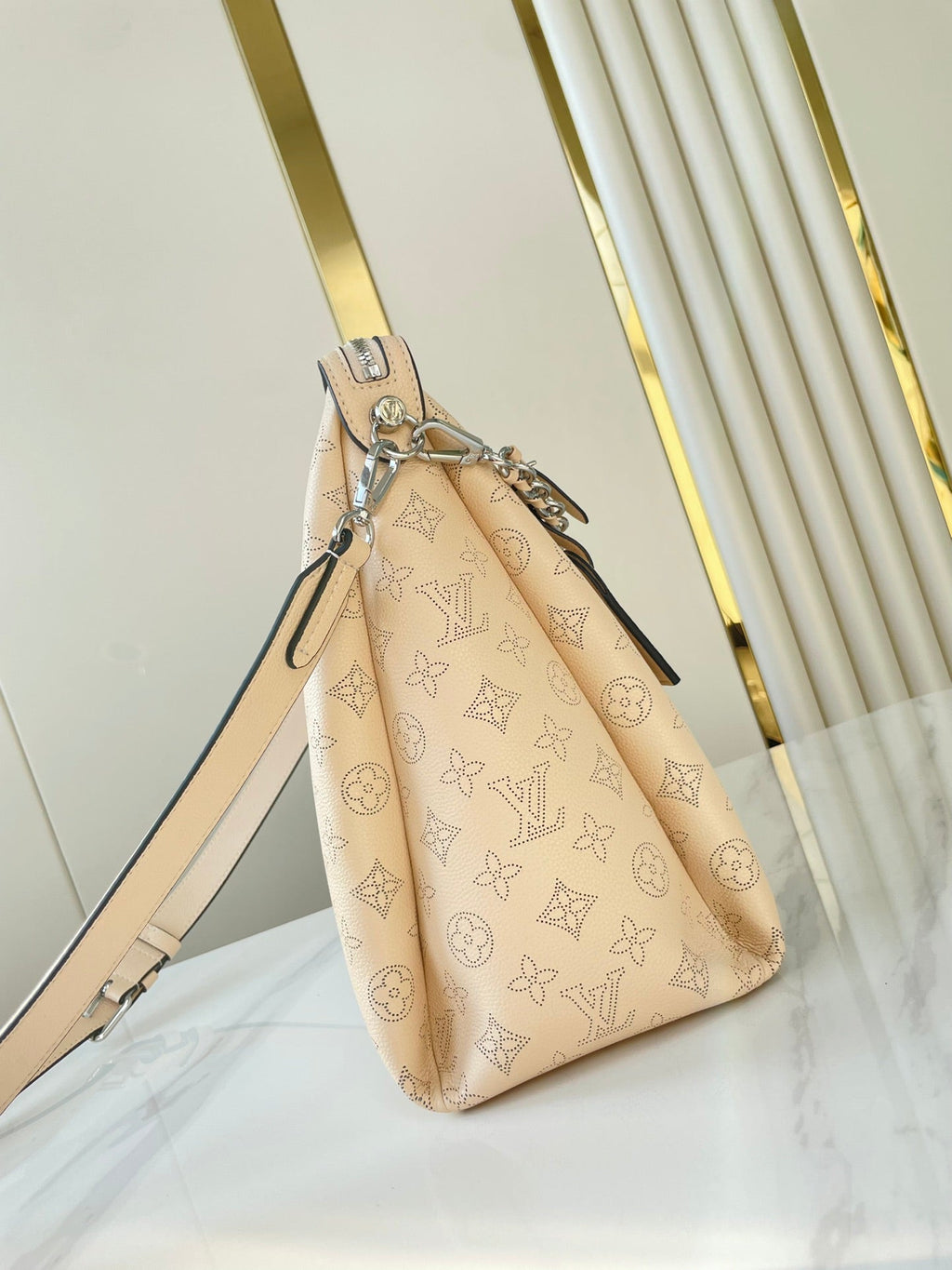 HAND IT ALL MM 32 IN CREAM MONOGRAM PERFORATE CALFSKIN SILVER HARDWARE