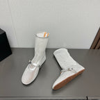 ALAIA SHORT BOOTS IN SILVER MESH FISHNET