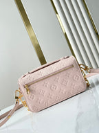 POCHETTE MÉTIS EAST WEST 21 IN PINK OPALE MONOGRAM ECLIPSE CANVAS GOLD BUCKLE