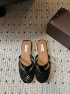 Alaia 25 Infradito Fishnet Flat Mules Black Lampskin 303708