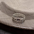 CC  RING LETTER DOUBLE C IN SILVER DIAMOND BLACK EMBOSSED LOGO