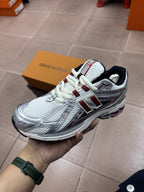 New Balance 1906R Low in the Silver Classic Crimson Mesh Calfskin